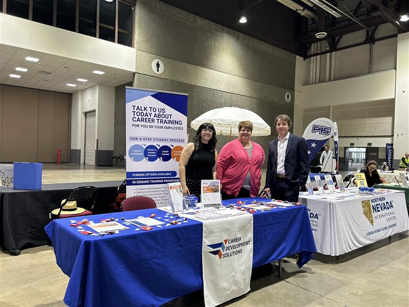 Career Development Solutions booth at "2024 Biggest Business Expo Ever" hosted by (from left) Grace Vazquez, Rena Drake, Sean Steffel, and Brian Mulholland (not pictured).